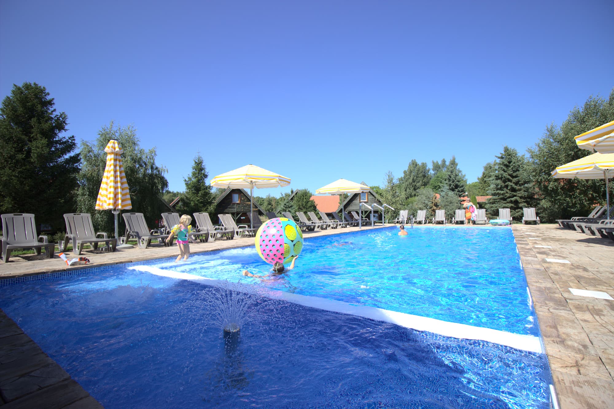 Pool with children playing